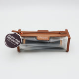 Cosmetic brush set in a brown case with 'Osmosis Beauty' branding on a white background.