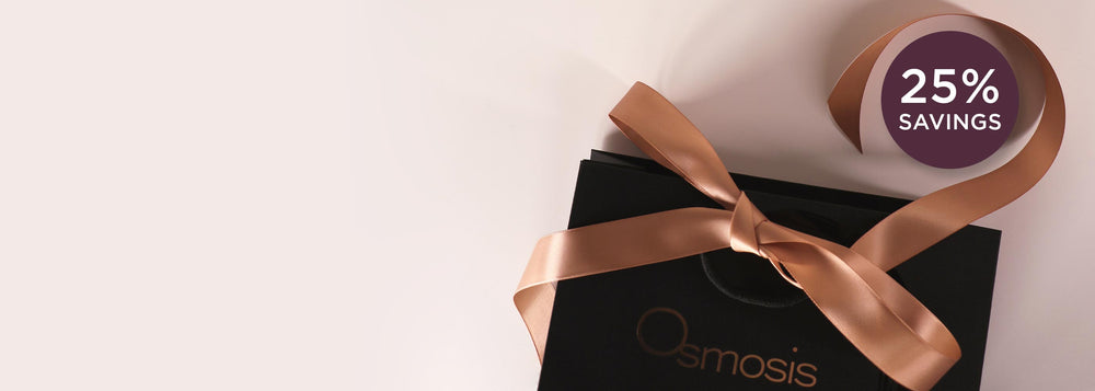 Black gift bag with a gold ribbon and 'Osmosis' branding, featuring a 25% savings label.