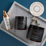 Osmosis Clarity Cleanse bundle on a marble tray with Clarity Cleanse Challenge seal.