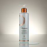 Osmosis Gentle Cleanser bottle with bronze cap on a gradient background