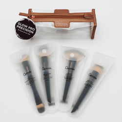 Set of makeup brushes with a clear pouch and 'Osmosis Beauty' branding on a white background.