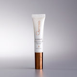 Osmosis Illuminate lip treatment tube on a gray background