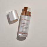 Osmosis Perfection skincare serum bottle on a light gray background
