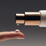 Osmosis Revive Hand cream applied to finger